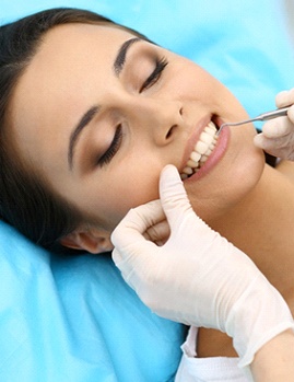 Woman having dental bonding procedure