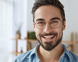 Young smiling man with dental implants in Dallas, GA