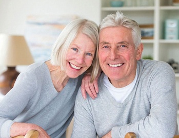 older couple smiling with dentures in Dallas GA