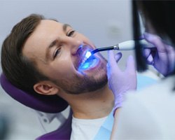 a patient undergoing the process of tooth colored fillings