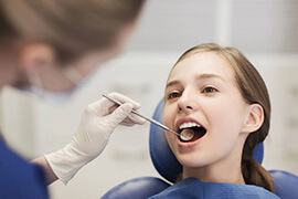 Girl at the dentist