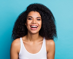 Woman after receiving a smile makeover in Dallas