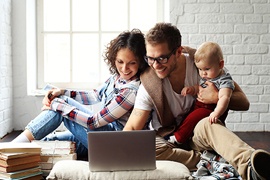 Family looking at computer