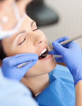 Woman relaxing with oral conscious sedation at the dentist’s office in Dallas, GA