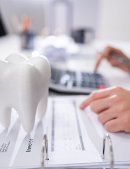 patient calculating cost of teeth whitening in Dallas 