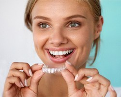 woman getting teeth whitening in Dallas 