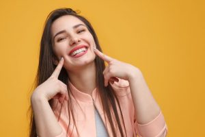 Woman smiling confidently.