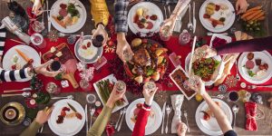 People toasting at a holiday dinner 