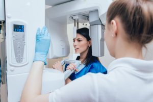 Patient getting X-rays from dentist in Dallas 