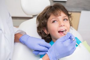 Child at visit with dentist in Dallas