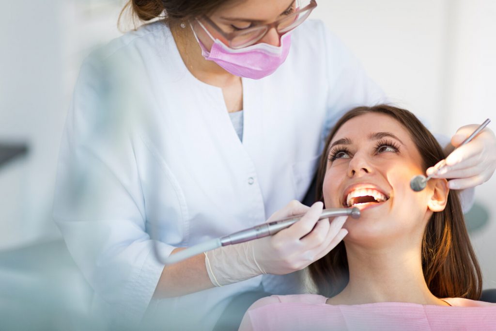 patient at dentist preparing to replace metal fillings in Dallas