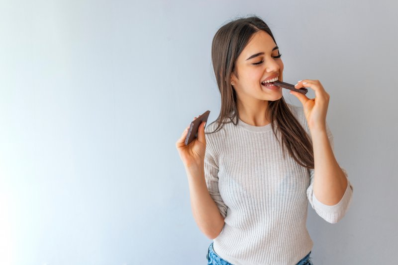 woman eating chocolate in Dallas