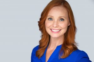 Smiling woman with dental implant