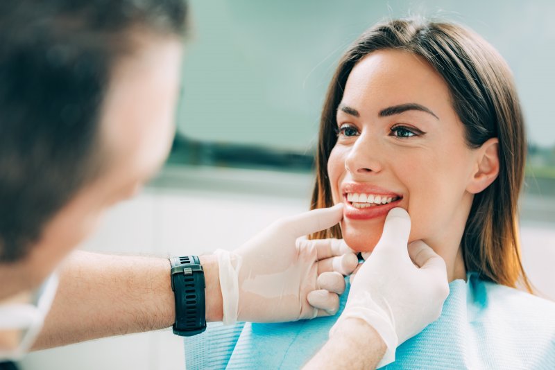 A woman receiving affordable cosmetic dentistry