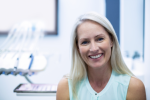 a dental patient smiling confidently 